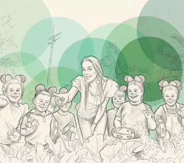 Niños y niñas frente a una huerta escolar